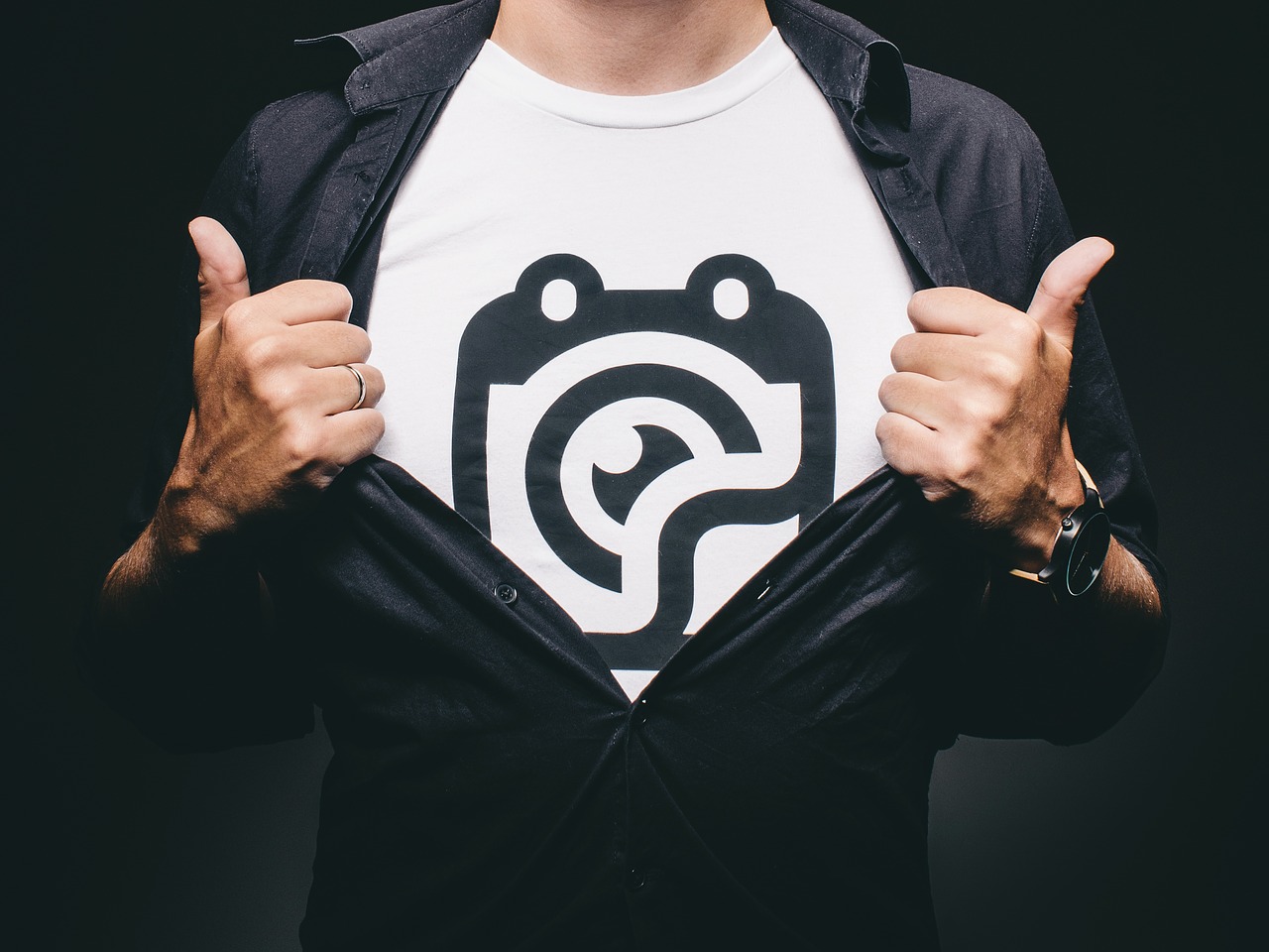 man showing off his graphic tshirt